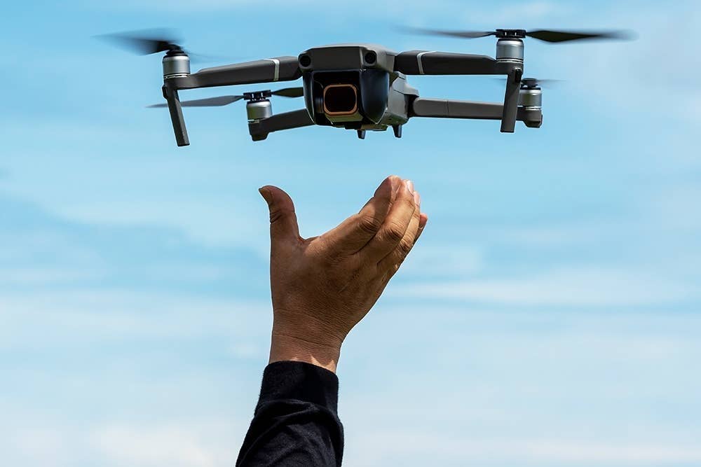 Man releasing a drone